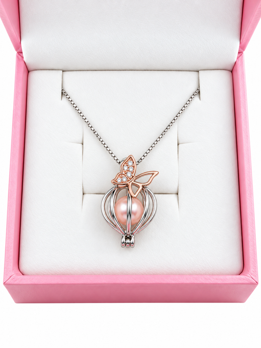 Sterling silver cage pendant with rose gold butterfly