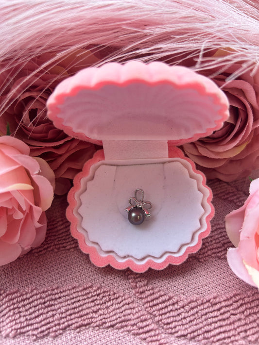 Sterling silver cubic zirconia bow drop pendant