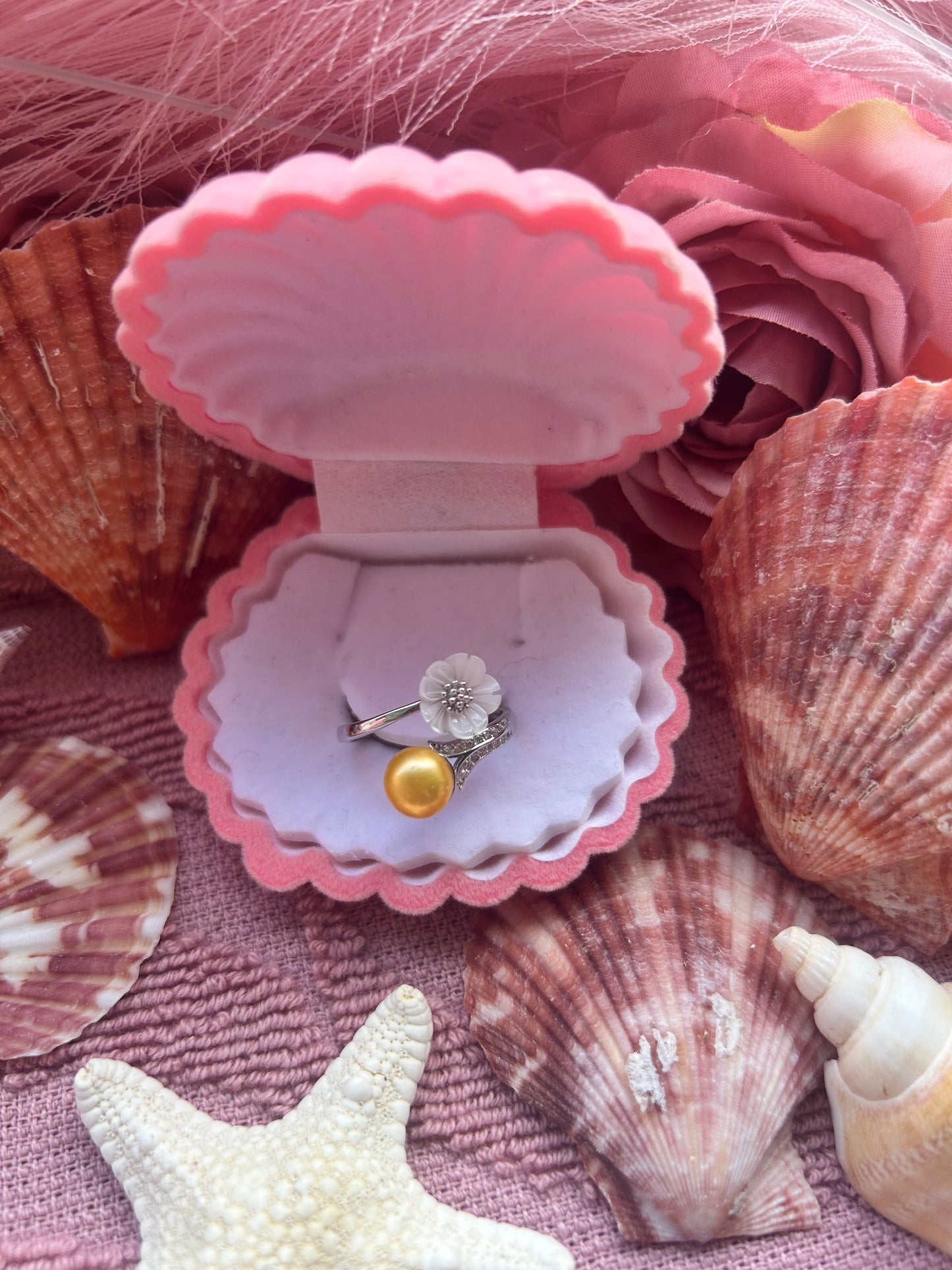 The Jenny Ring. Sterling silver with shell flower adjustable ring.