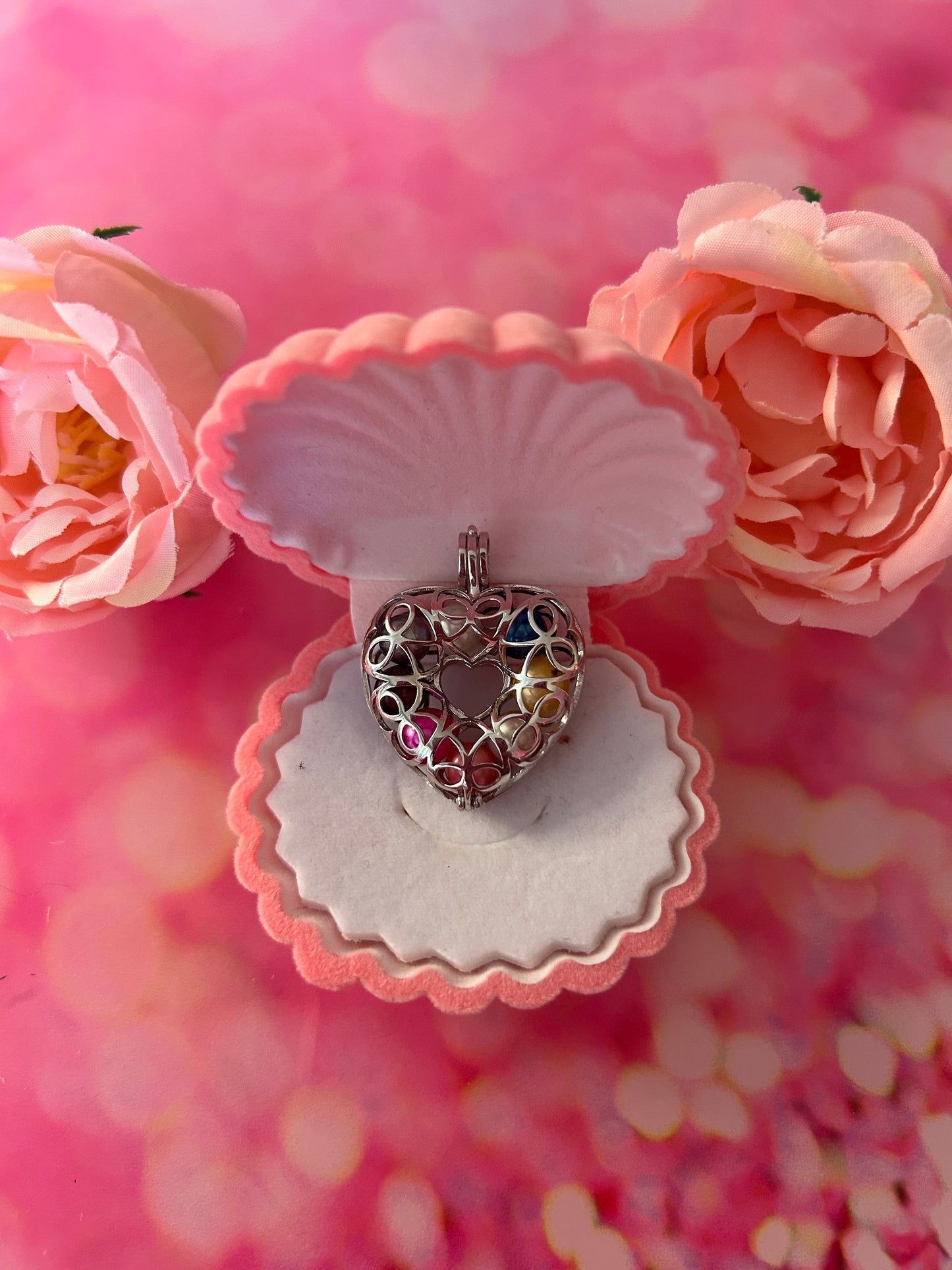 Sterling silver full heart cage pendant