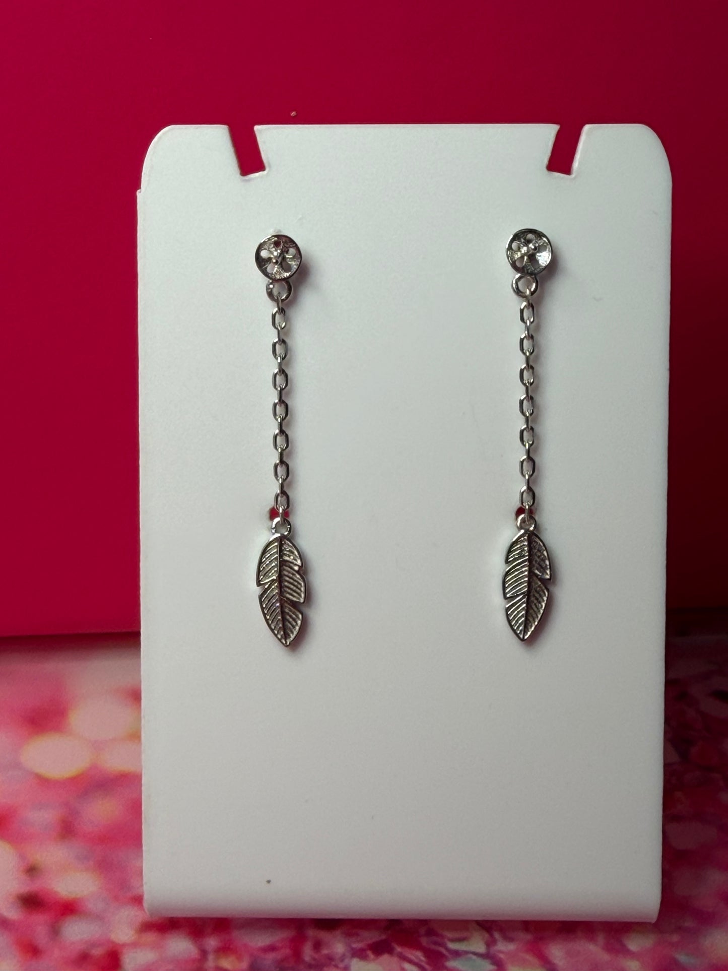 Sterling silver feather dangle earrings