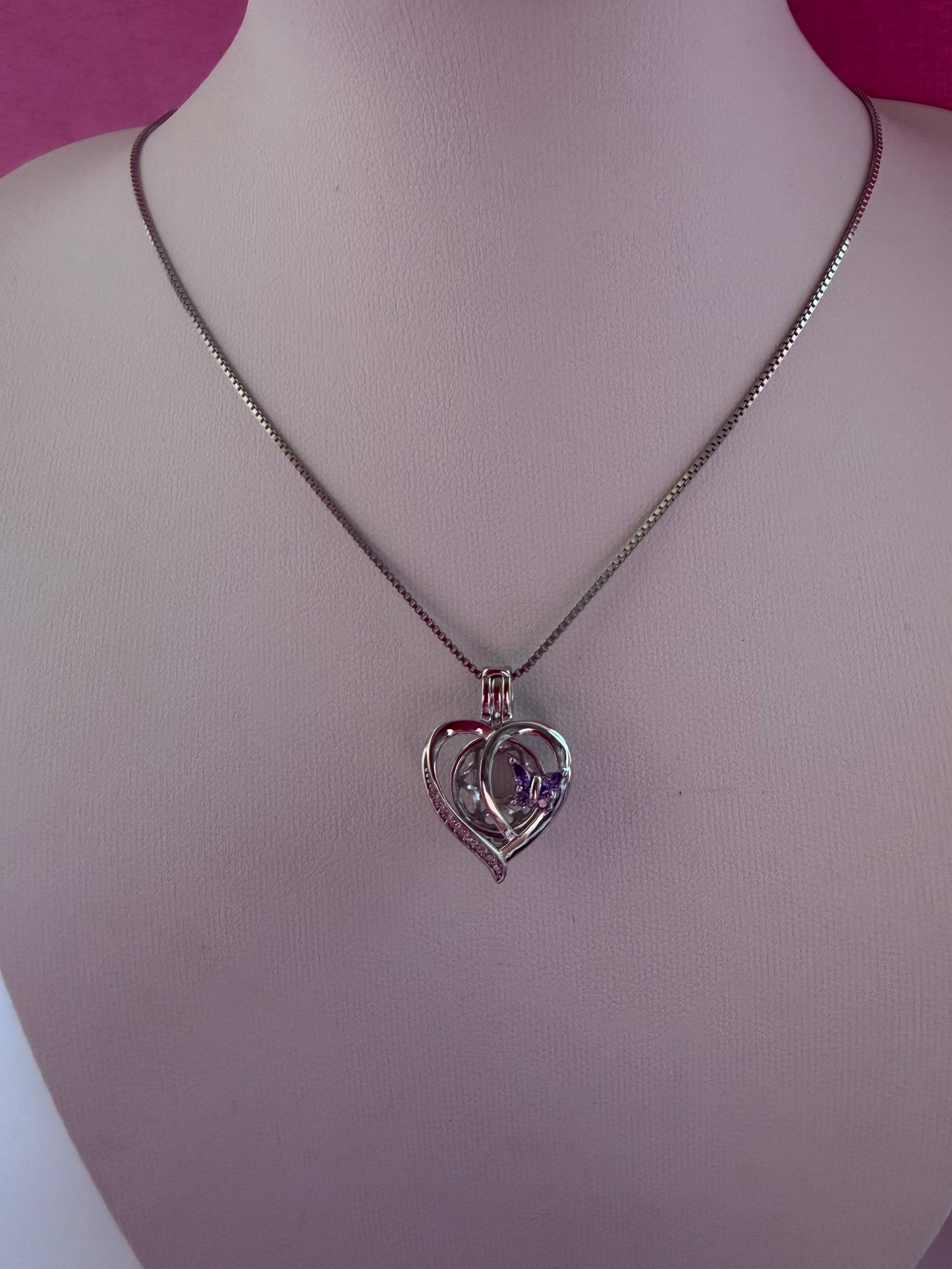 Sterling silver purple cz butterfly cage pendant