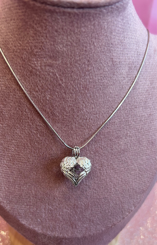 Silver plated angel wings cage pendant